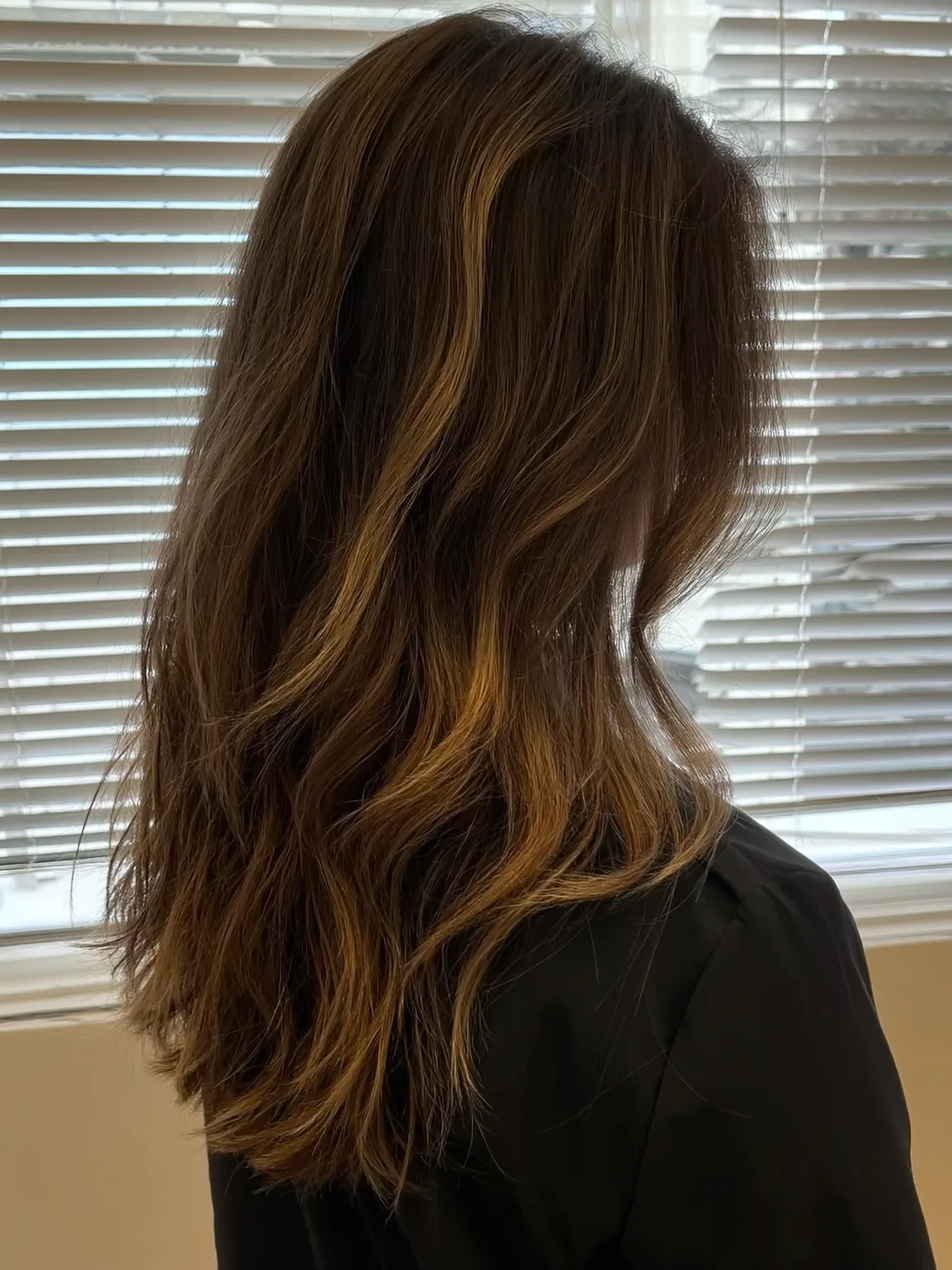 warm chestnut brown with golden highlights long layers